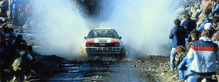 Illustration for article titled Crowning The King Of 1986: Audi Quattro S1 vs Ford RS200 vs Lancia Delta S4 vs Peugeot 205 TI6